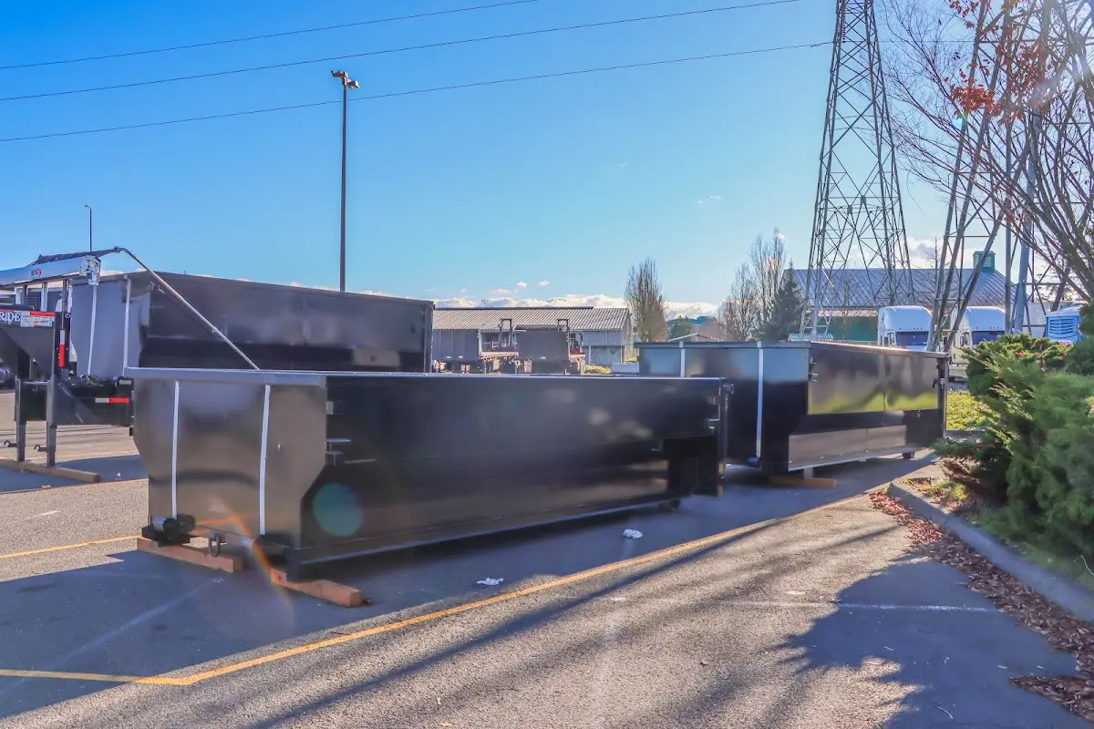 Roll-off dumpster ready for waste disposal at job site for 2 Yard Dumpster Rental in Wonder Lake